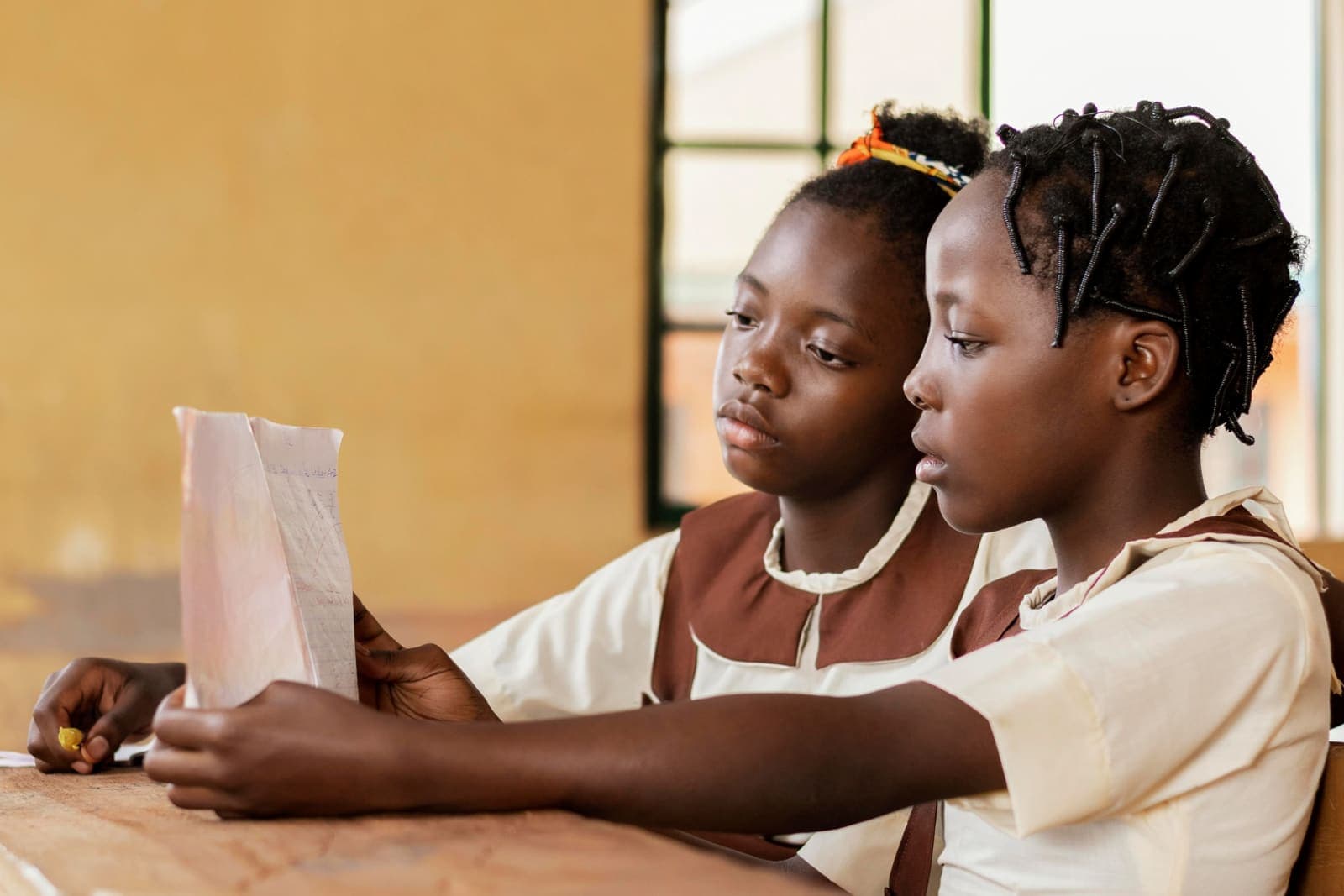 Pupils paying attention in class